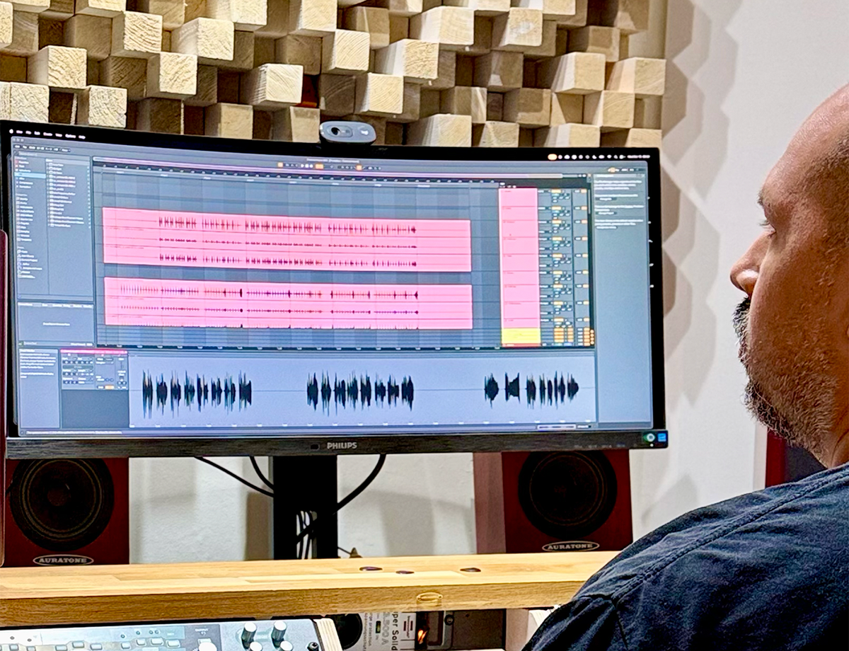 Producer behind studiodesk